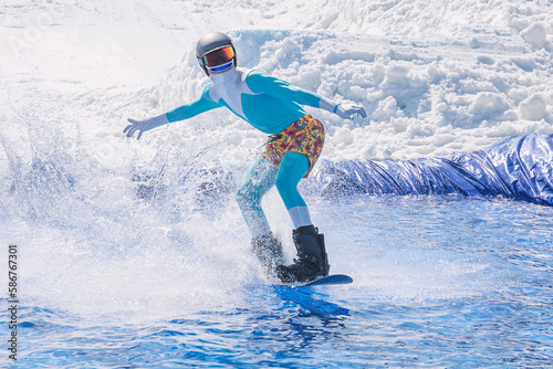 People are enjoying Pond skim at the end of ski season photo