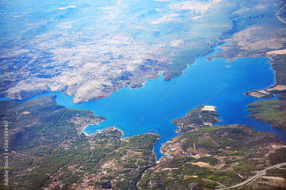 Flight over water bay and mountains . Sibenik-Knin County Croatia