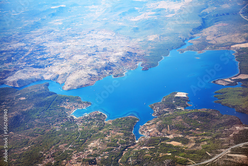 Flight over water bay and mountains . Sibenik-Knin County Croatia © russieseo