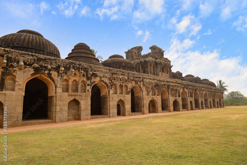 Medieval elephant stable ruins is a popular tourist destination at Hampi Karnataka India