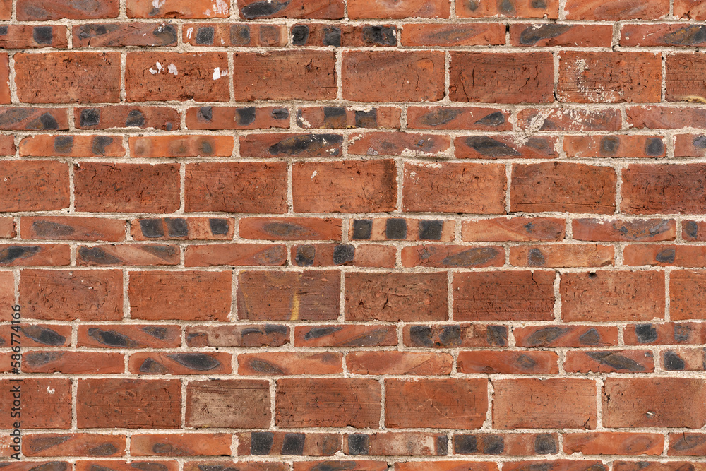 Fototapeta premium red brick wall at square format as background and texture