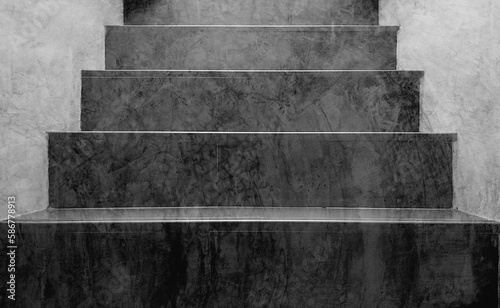 Gray polished concrete steps, and loft stairway texture for the background.