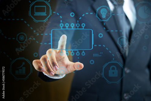 Businessman pointing his finger on virtual technology screen