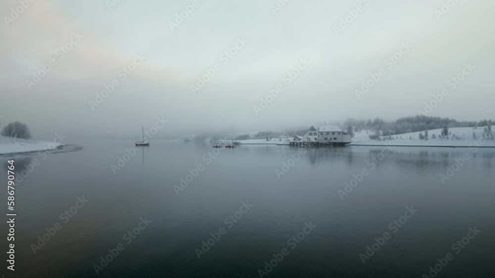 Nordic landscape on cloudy day, Kvaloya or Sallir island, Tromso in Norway. Aerial sideways and space for copy Nordic landscape on cloudy day, Kvaloya or Sallir island, Tromso in Norway. Aerial sideways and space for copy