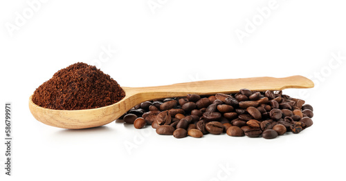 Wooden spoon with coffee powder and heap of beans isolated on white background