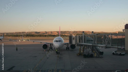 Airplane Landed and preparing to engage with the jet-bridge and disembark the passengers