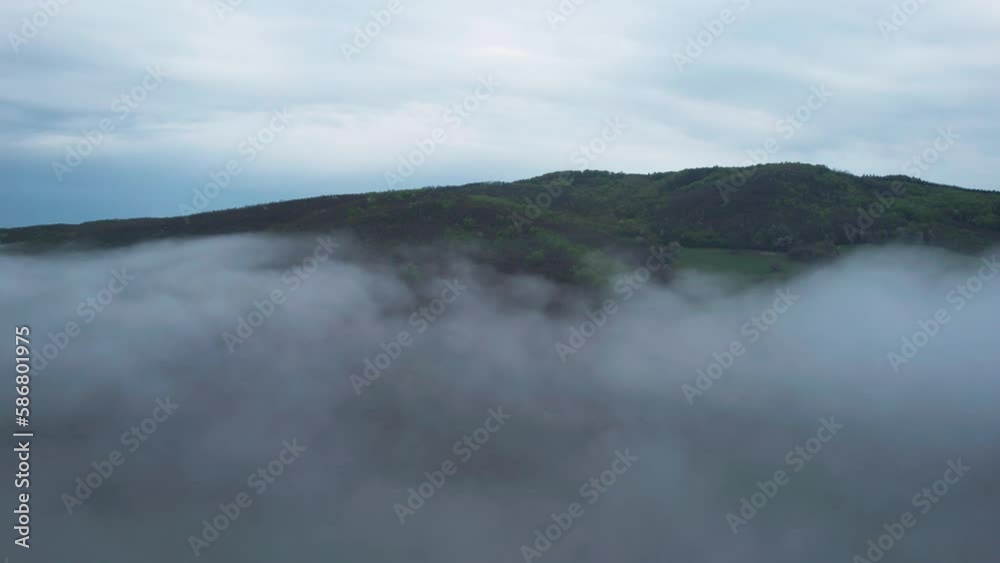 Low tatra mountains outdoor landscape, aerial drone flying through clouds Low tatra mountains outdoor landscape, aerial drone flying through clouds