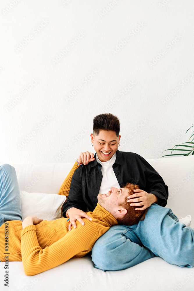 Man lying in the lap of his gay couple Man lying in the lap of his gay couple