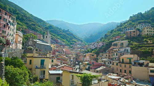 Wallpaper Mural Beautiful seaside village of Riomaggiore in Italy. The most southern village of the five Cinque Terre with a small beach and a wharf framed by colorful tower houses in Europe. Torontodigital.ca