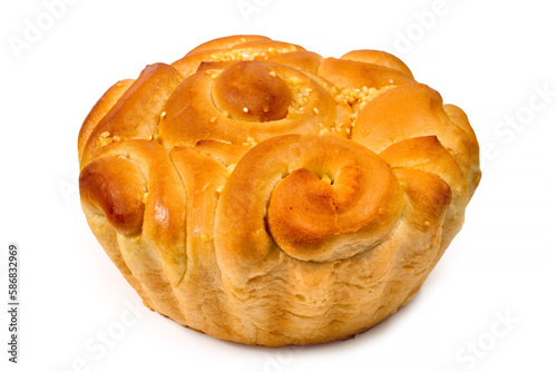 A loaf on a white background. Ukrainian pampushka with garlic. Bakery products close-up.