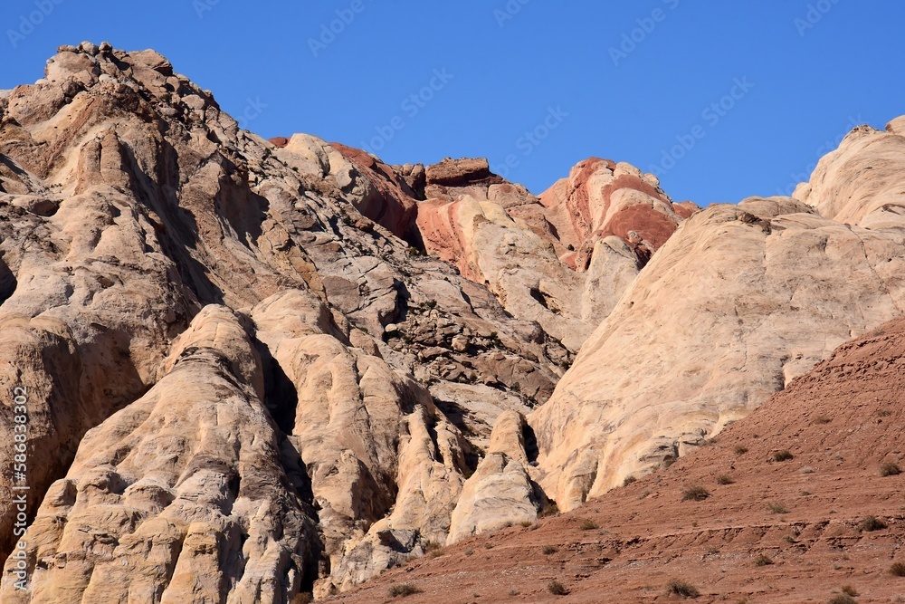 the  colorful flatiron rock formations in the san rafael reef near uneva canyon on a sunny spring  day, near green river, utah