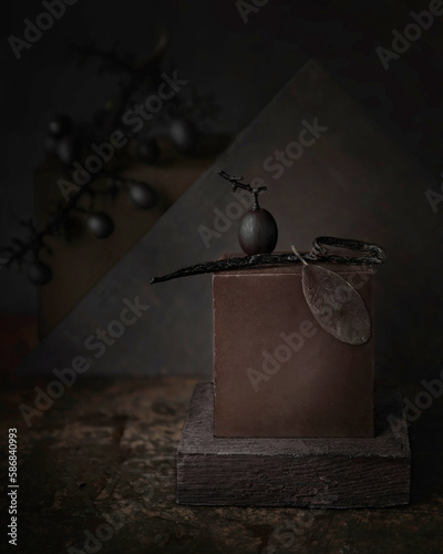 chocolate panna cotta with vanilla on a dark brown background. Conceptual artistic photo