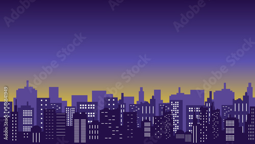 Panoramic silhouette of the city and many tall buildings against the purple sky