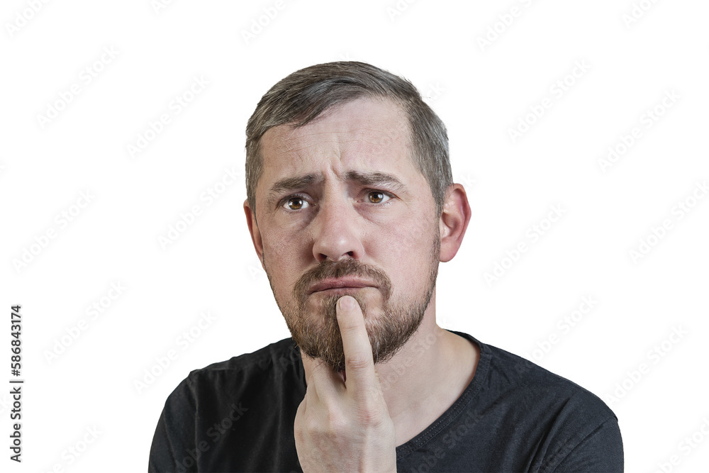 Portrait of an attractive bearded man of European appearance, with a slight gray hair, on an isolated white background. He holds his finger thoughtfully to his chin. Expression of emotions of a man. Portrait of an attractive bearded man of European appearance, with a slight gray hair, on an isolated white background. He holds his finger thoughtfully to his chin. Expression of emotions of a man.