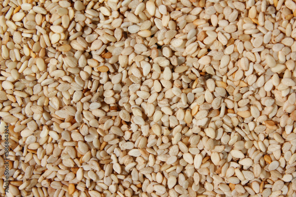 Heap of organic natural sesame seeds
