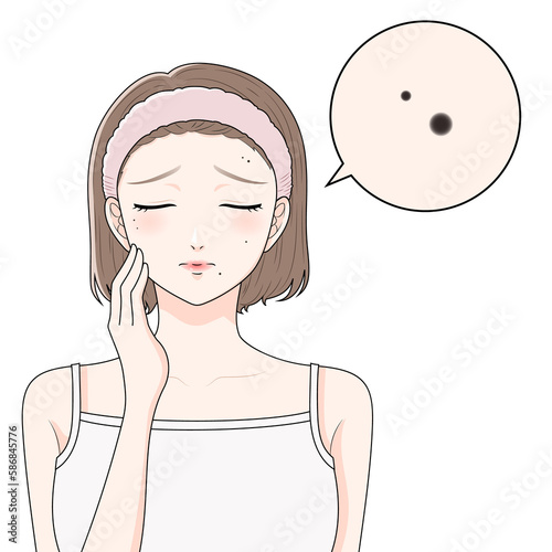 ほくろに悩むヘアバンドをつけた女性　拡大　目を瞑る