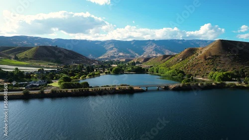 Aerial over Cromwell Lowburn. This small town is situated in Central Otago on the Southern Island of New Zealand. Dolly forward drone footage photo