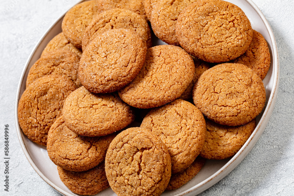sweet soft ginger cookies on plate, top view sweet soft ginger cookies on plate, top view
