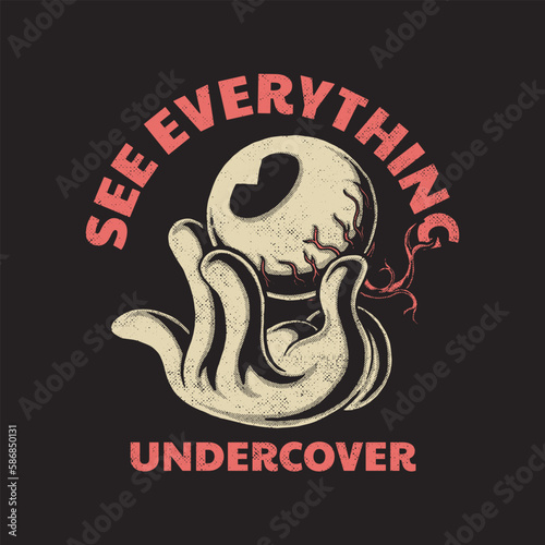 cartoon emblem of hand holding an eye with retro style