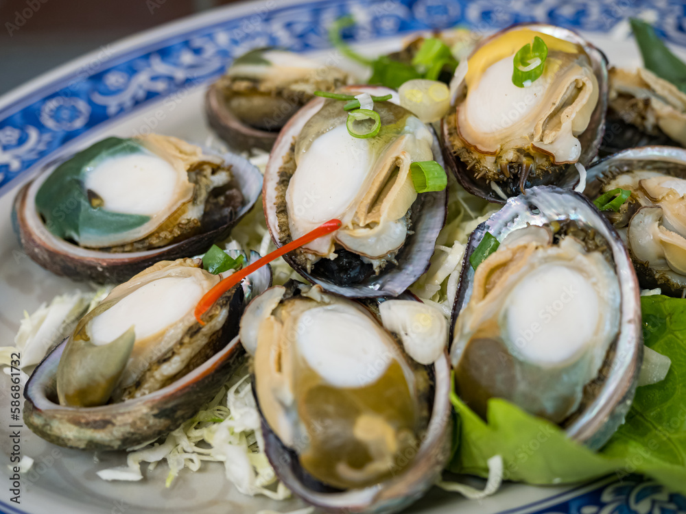 Closeup of Delicious steamed abalones.