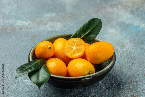 Raw Organic Orange Kumquats, banner, menu, recipe place for text, top view photo