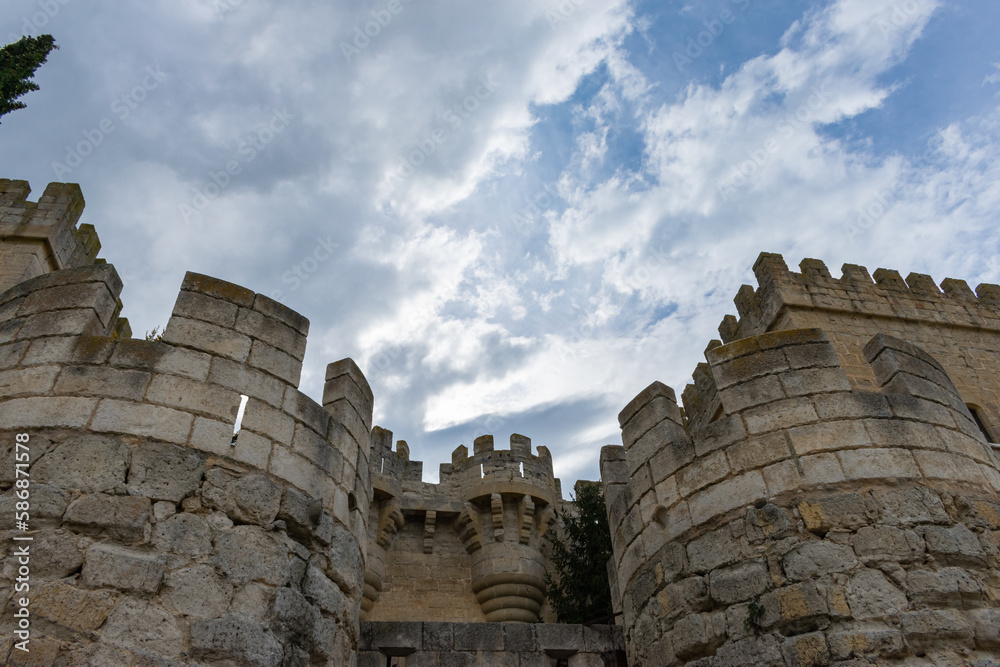 detail of the battlements of the towers of a medieval castle