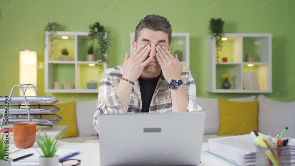 Mature man with sore and dry eyes from work is at home.
Man with sore eyes from looking at laptop is rubbing his eyes.
Mature man with sore and dry eyes from work is at home.
Man with sore eyes from looking at laptop is rubbing his eyes.