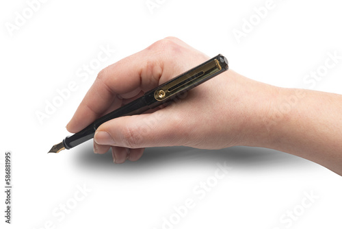 Woman using a fountain pen to write or sign
