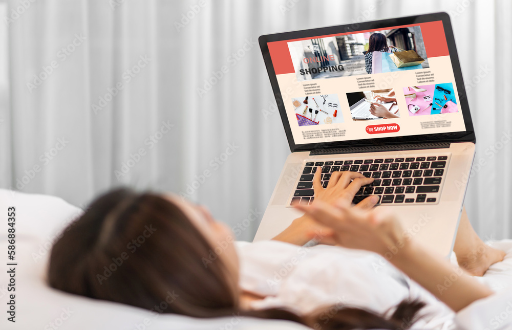 Portrait of woman relax use technology of laptop computer for fashion online shopping.Young girl enjoy shopping time summer sale and buy something purchases at home.online shopping concept Portrait of woman relax use technology of laptop computer for fashion online shopping.Young girl enjoy shopping time summer sale and buy something purchases at home.online shopping concept