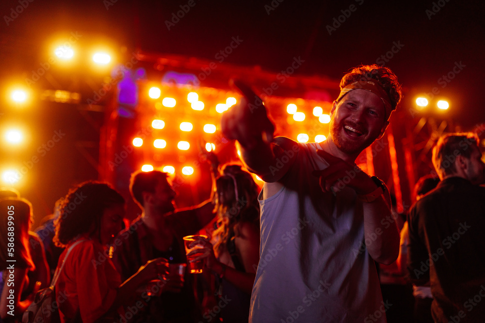 Ginger man dancing at concert