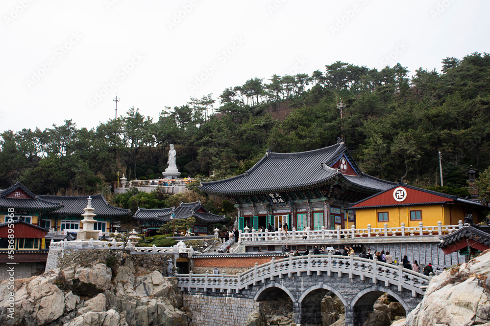 View landscape along coastline and Haedong Yonggungsa temple for korean people travelers travel visit respect praying blessing wish buddha at Gijang on February 18, 2023 in Busan or Pusan, South Korea