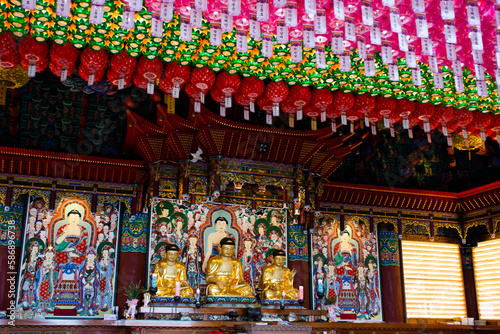 Haedong Yonggungsa temple or Yonggung shrine for korean people foreign travelers travel visit and respect praying blessing wish holy mystery buddha worship on February 18, 2023 in Busan, South Korea photo