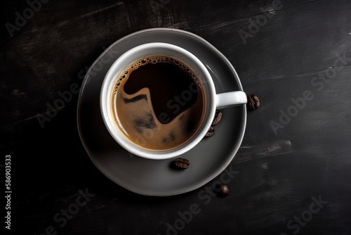 Top view of a cup of black coffee on a dark background