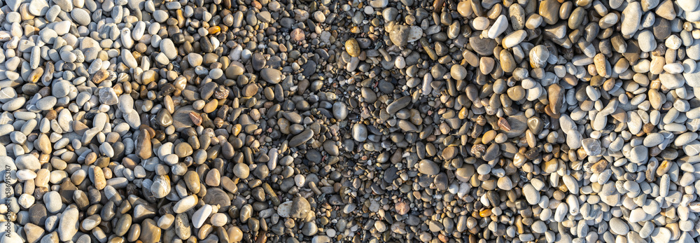 Colored pebble beach texture background Colored pebble beach texture background
