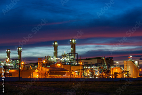 Twilight scene of tank oil power plant