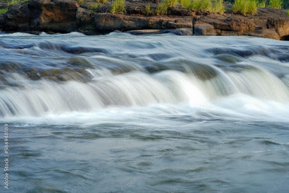 Obraz premium Small Water fall Long Exposure river stream