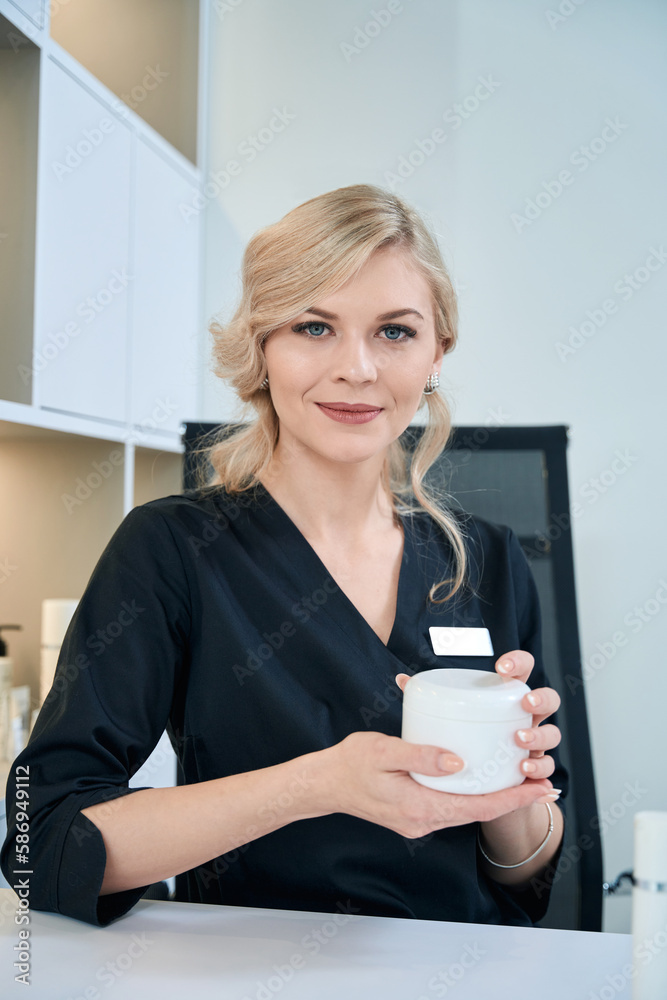 Close up photo of smiling dermatologist looking at the camera Close up photo of smiling dermatologist looking at the camera