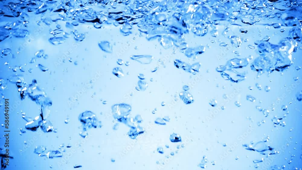 Many bubbles in water close up, abstract water wave with bubbles in slow motion Many bubbles in water close up, abstract water wave with bubbles in slow motion