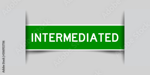 Inserted green color label sticker with word intermediated on gray background