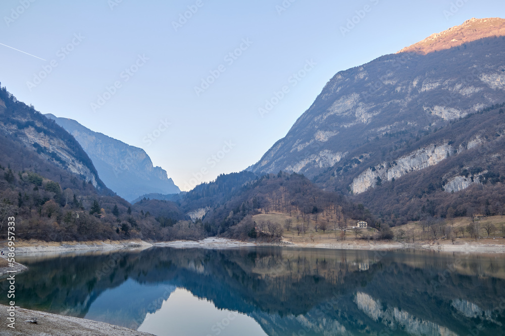 The view of Lake Tenno in spring,Trento,Italy, Europa. Turquoise lake in the mountains The view of Lake Tenno in spring,Trento,Italy, Europa. Turquoise lake in the mountains