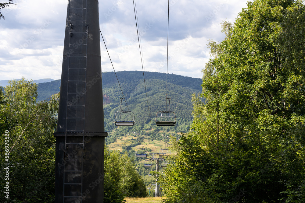 Mountain lift on sky background. Empty space for text Mountain lift on sky background. Empty space for text