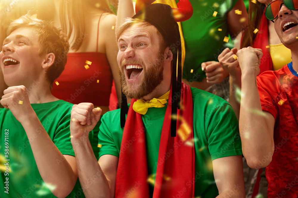 Portugal emotive football, soccer fans cheering their team at stadium