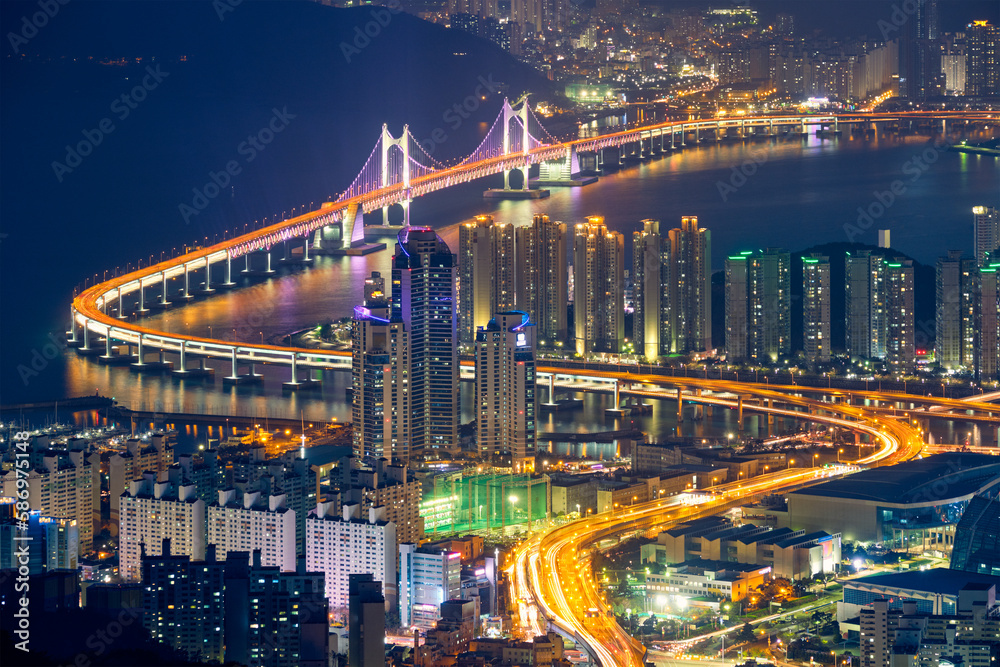 Obraz premium Busan cityscape with skyscrapers and Gwangan Bridge illuminated at night. Busan. South Korea