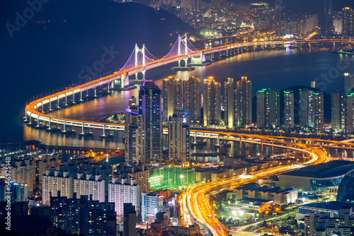 Busan cityscape with skyscrapers and Gwangan Bridge illuminated at night. Busan. South Korea © Dmitry Rukhlenko