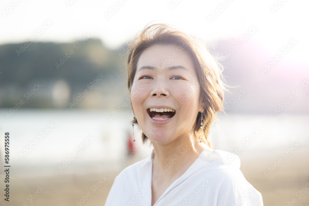 Smiling, laughing, joyful Japanese women in their menopause and 40s. Smiling, laughing, joyful Japanese women in their menopause and 40s.