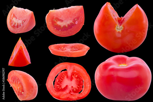 Set with sliced red tomatoes isolated on black background. © Николай Батаев