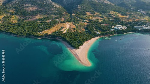 Aerial drone view of Zlatni Rat beach in Adriatic sea on Brac island, Dalmatia, Croatia. Summer vacation resort photo