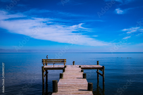 Blue sky and wooden fishing pier, Chesapeake Bay 