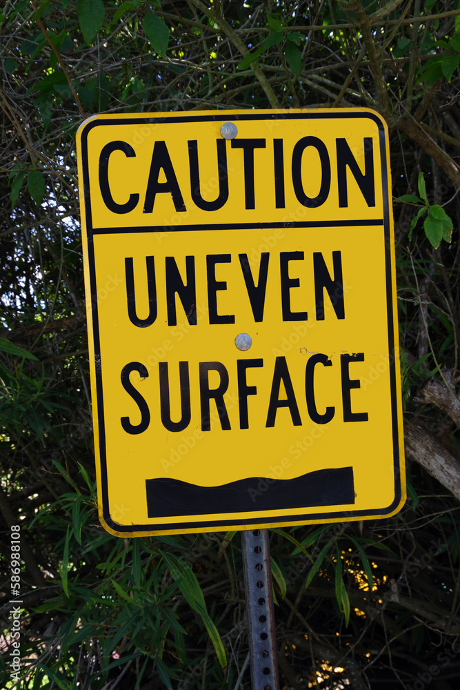 Warning sign CAUTION - UNEVEN SURFACE