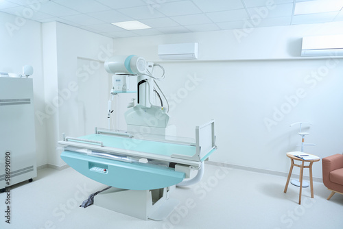 X-ray room with modern X-ray machine in hospital